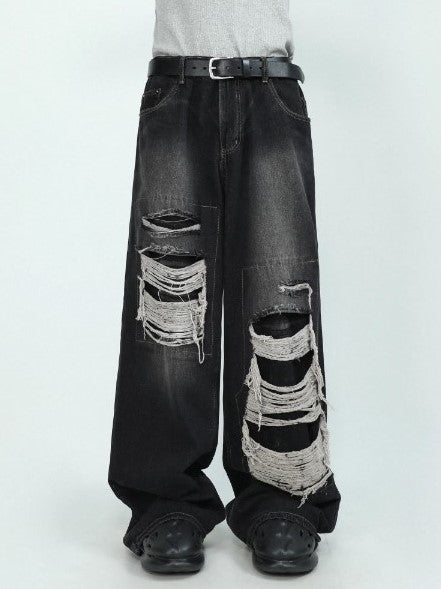 OPIUM-STYLE RIPPED JEANS